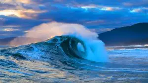 Illustration of a colossal rogue wave off the coast of Vancouver Island. Image generated by AI.