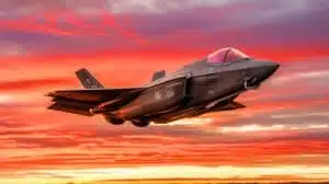 Illustration of an F-35C Lightning II fighter jet taking off from an aircraft carrier.