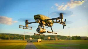 Illustration of a US Army quadcopter armed with a Claymore mine during a military exercise at Fort Rucker.