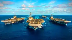 Illustration of a U.S. naval carrier strike group operating in the Caribbean near Venezuela.
