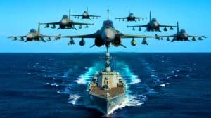 Illustration of Chinese jets simulating a missile strike on a British warship in the Taiwan Strait.