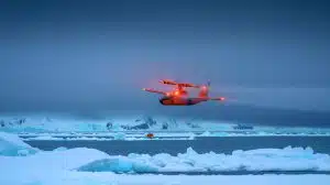 “Please Let Them Be Found”: This Alaska Plane Vanished Into a Blizzard With 10 Aboard (and Rescuers Are Racing the Clock) Illustration of a search and rescue operation over the icy waters of Norton Sound, Alaska, amidst harsh weather conditions.