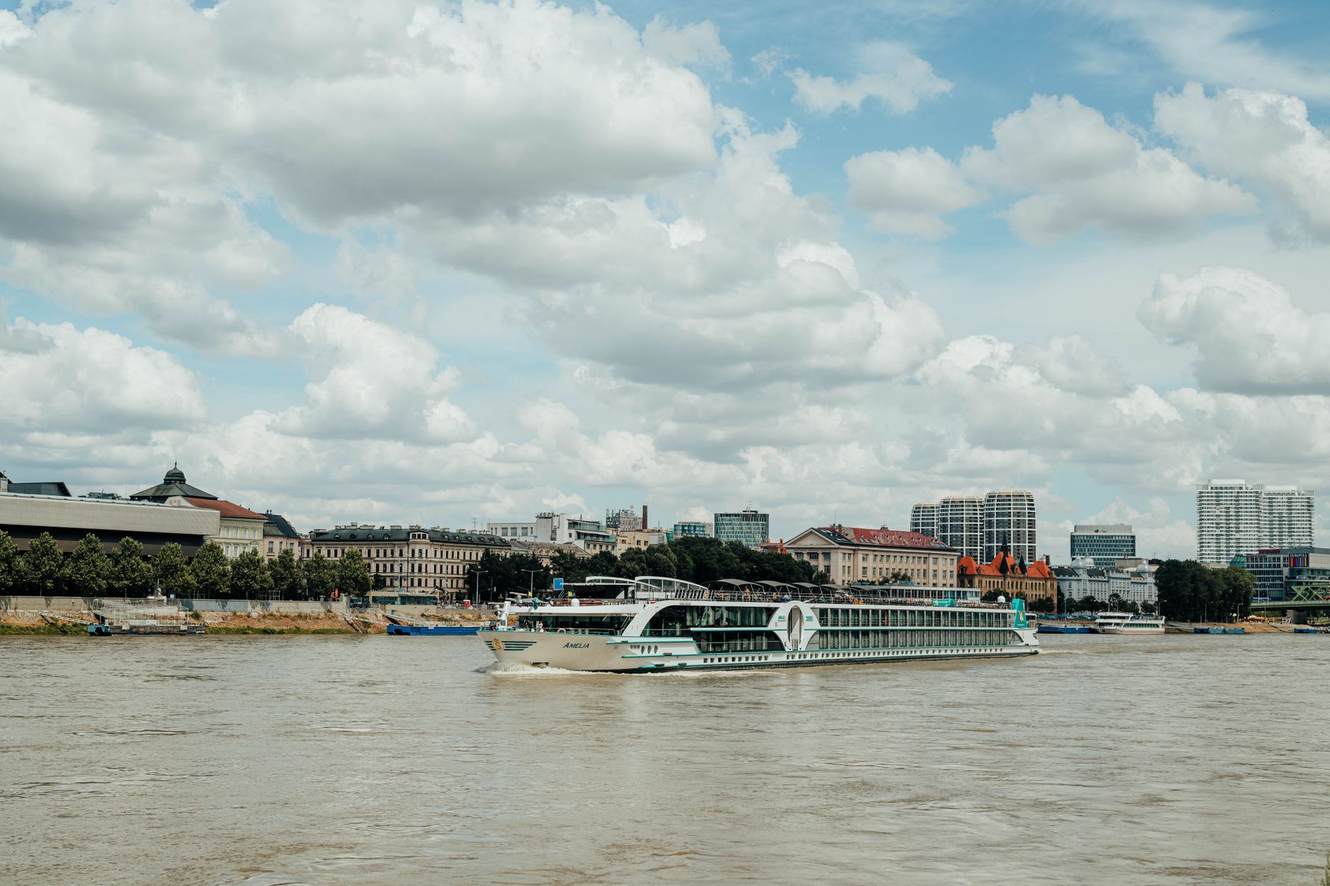 Cruise ship navigating a shallow section of the Danube River